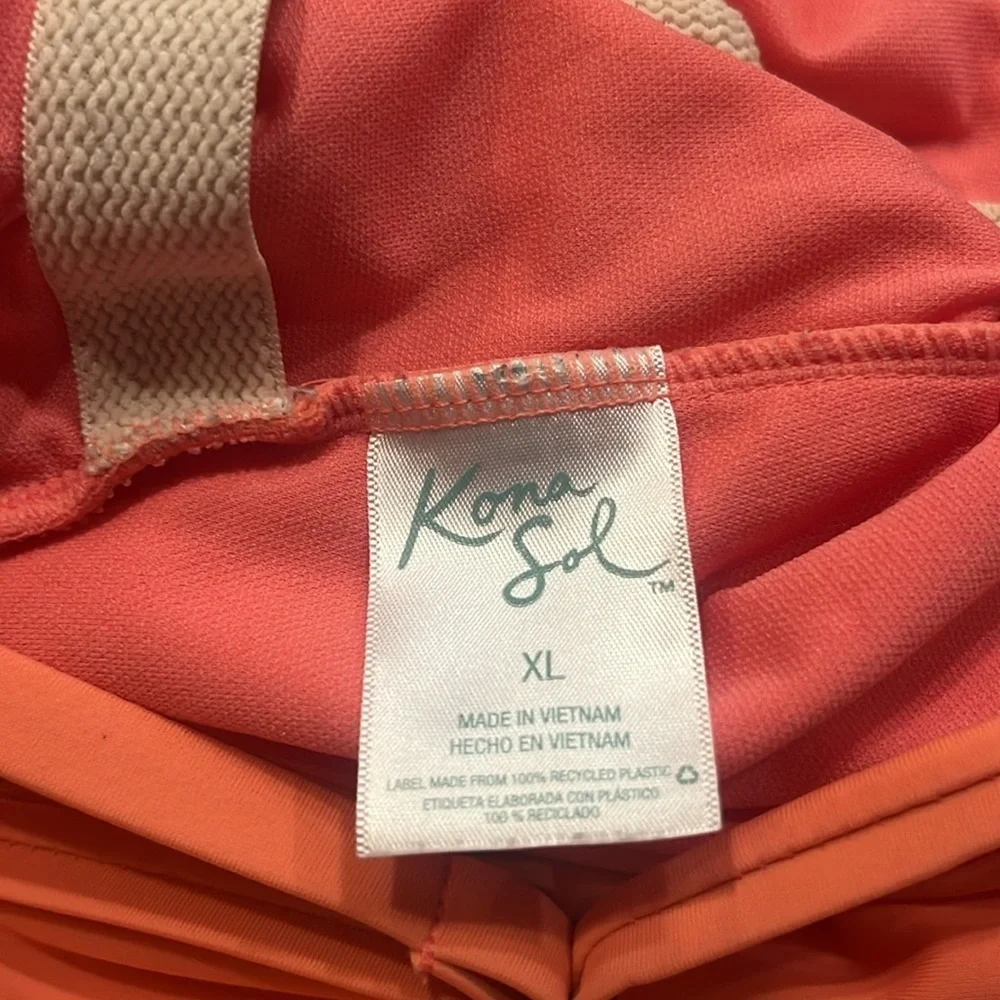 Kona sol women’s peach color vneck one piece swimsuit size xlarge.